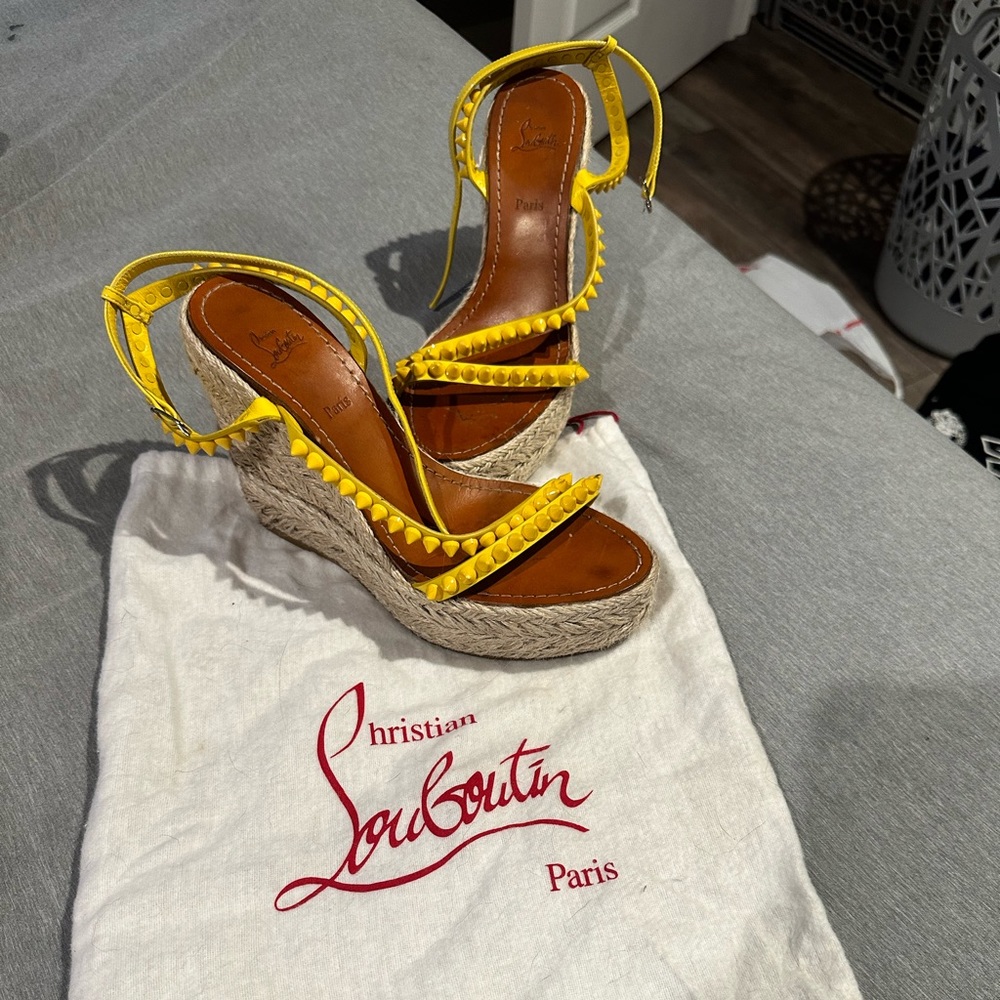 Lightly warn Louboutin wedges